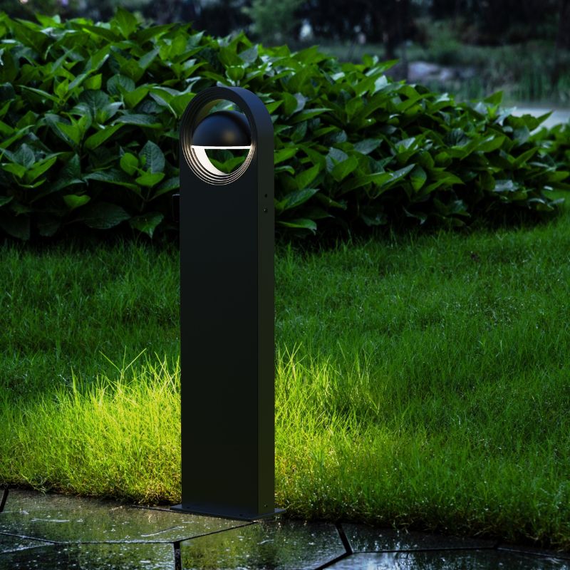 Ningbo Hanyuan smart Tuya floor lamp explore black, designed for outdoor use, illuminating a grassy area with a sleek, modern aesthetic.