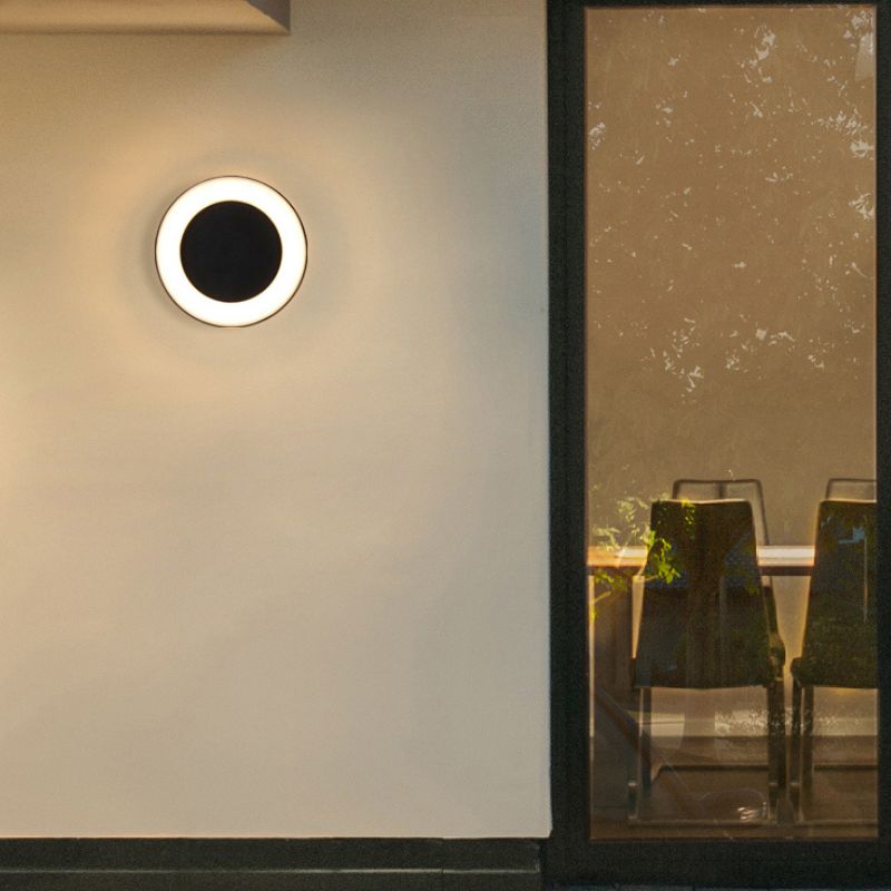 Ningbo Hanyuan smart Tuya wall lamp, black moon design installed indoors, illuminating the wall in a modern setting.