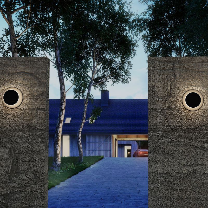 Ningbo Hanyuan smart Tuya wall lamp, black moon design installed on outdoor wall, illuminating the entrance.