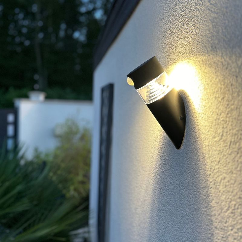 Ningbo Hanyuan Orion black solar sconce, featuring a sleek design with spiral lighting effect, perfect for outdoor wall lighting.